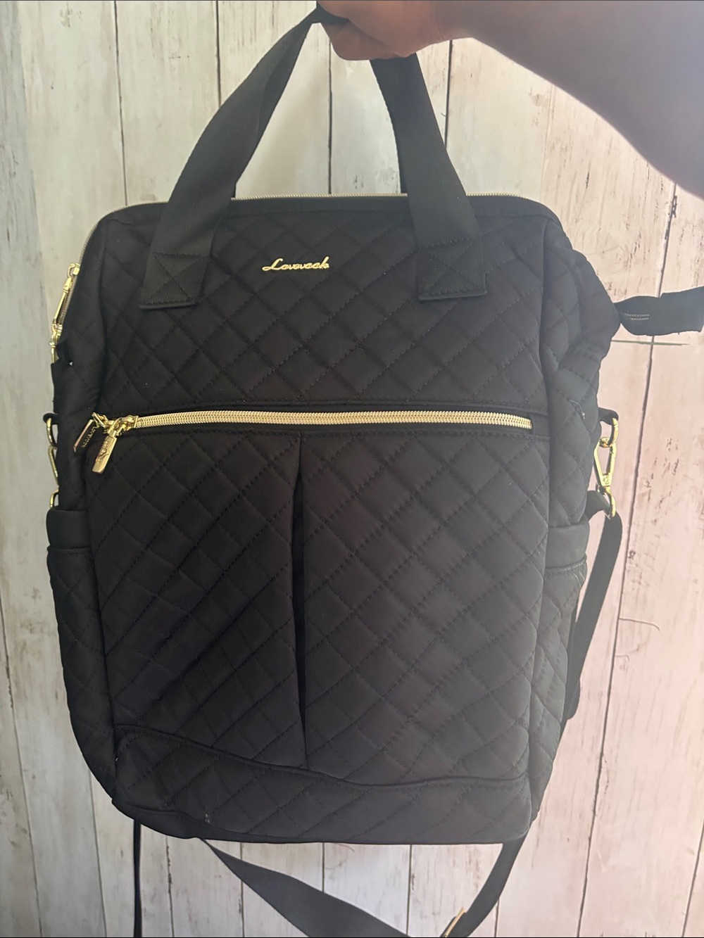 Stylish Quilted Black Backpack with Gold Hardware